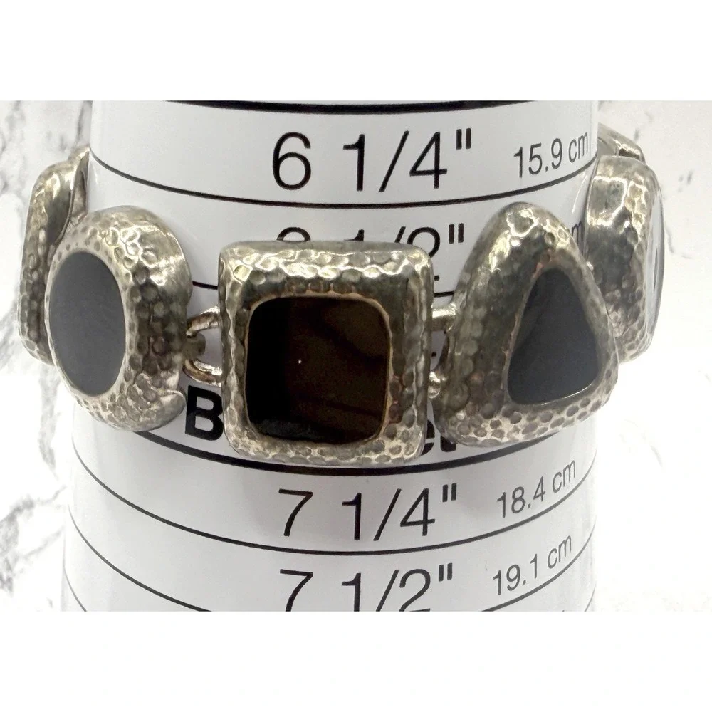 Source Unknown bold silver